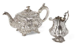 
	
		A George III repousse silver teapot, London, c.1818, Solomon Royes & John East Dix, 
