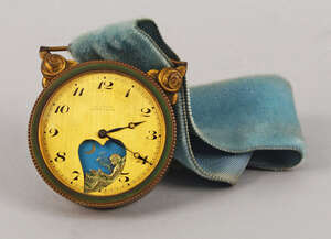 
	
		A 'Le Petit Forgeron' pocket watch, 20th century, the dial with Arabic numeral chapter...