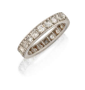 
	
		A platinum and diamond eternity ring, composed of a single row of brilliant-cut diamonds,...
