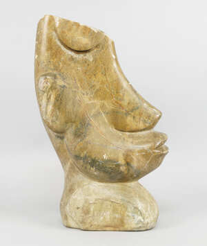
	
		An African carved stone bust of a man, in the manner of the Solman Islands, 20th century,...