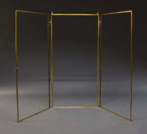 
	
		A brass couture three fold mirror frame, early 20th Century, 165cm x 240cm wide

	

