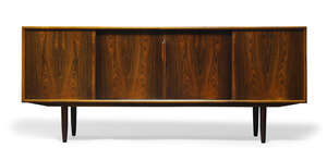 
	
		Attributed to Gunni Omann (Danish 1930-2009), a rosewood sideboard for Axel Christensen...
