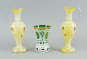 A green and white overlay glass vase, in the Victorian taste, decorate with flowers and gilt scroll work, 14cm high, together with a pair of Continental yellow
