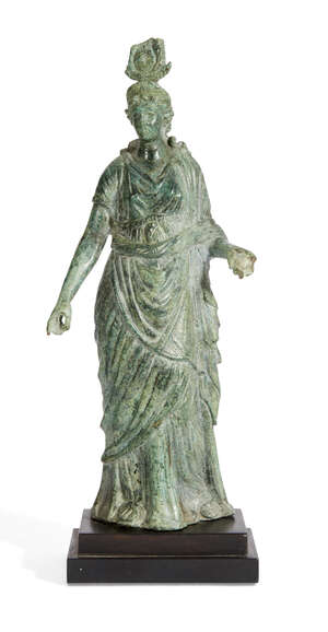 
	
		A Hellenistic bronze statue of the Isis Fortuna, 1st Century B.C., the goddess stands...