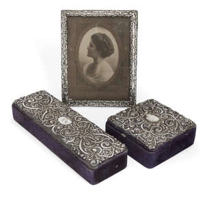 
	
		An Edwardian silver easel back photo frame, Birmingham, c.1906, H J Cooper & Co Ltd.,...