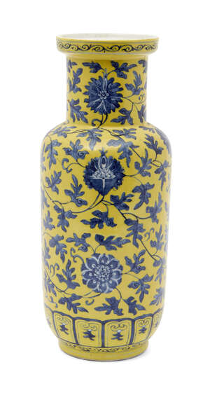 
	
		A Chinese porcelain underglaze blue and yellow enamel rouleau vase, late Qing dynasty, 