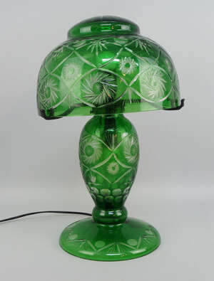 
	
		A Victorian green and clear overlay glass lamp, converted to electricity, the domed shade...