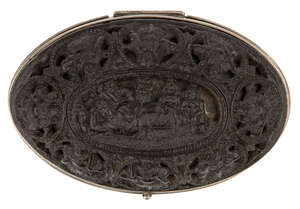 
	
		A deeply carved ebony and silver inlaid casket in the form of an egg, South India or...