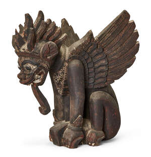 
	
		A Balinese carved wood figure of Garuda, mid-20th century, carved crouching with wings...