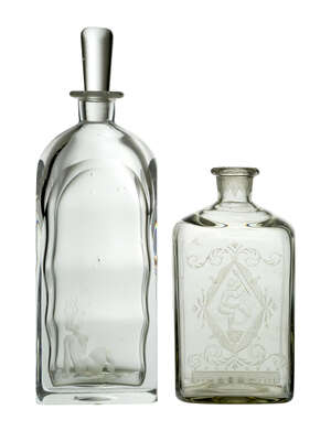 
	
		Simon Gate (1883-1945), an Orrefors engraved smoky glass carafe
		c.1924, engraved...
