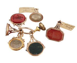A group of six late 18th / early 19th century gold fob seals, including: one of swivel design, one side with engraved figure of Hope the other with a miniature