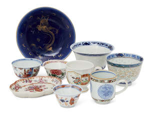 
	
		Nine pieces of Oriental porcelain, 18th-early 20th century, comprising a blue-glazed dish...