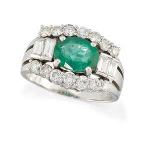 
	
		An emerald and diamond ring, the oval-cut emerald with graduated baguette-cut diamond two...