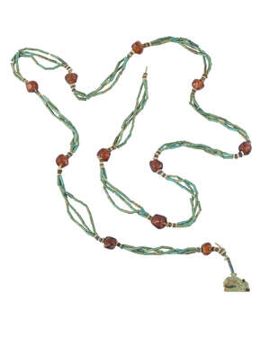 An Egyptian mummy bead necklace, composed of glazed composition cylindrical and disc mummy beads and a glazed composition sow amulet, Late Period, circa 664-33