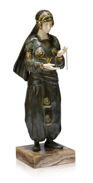
	
		Hester Mabel White (act. 1898-1948), a patinated and cold painted bronze and ivory...