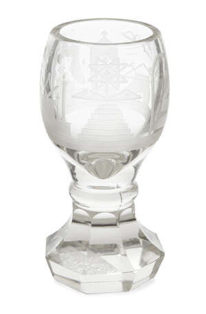 
	
		A Masonic glass goblet, early 20th century, the bowl etched with Masonic iconography,...