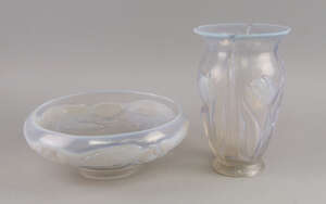 A Barolac opaline glass bowl, Czechoslovakian, 20th century, moulded with lily pads and flowers, 24.5cm diameter, together with a square form vase, also Barola