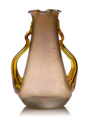 
	
		Possibly Loetz, an iridescent glass vase with handles
		c.1920
		Tapered form with...