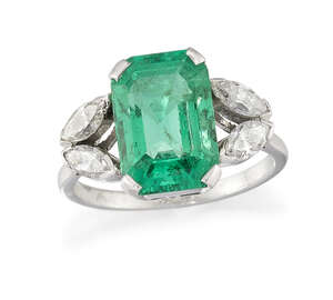 
	
		An emerald and diamond ring, the cut-cornered rectangular emerald to marquise-cut diamond...