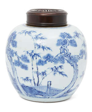 A Chinese porcelain 'three friends of winter' ginger jar, Kangxi period, painted in underglaze blue with pine, prunus, and bamboo in a continuous lands