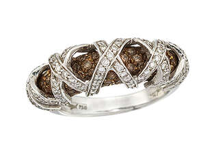 
	
		A diamond and coloured diamond ring, of half-hoop design set with pave brown diamonds...