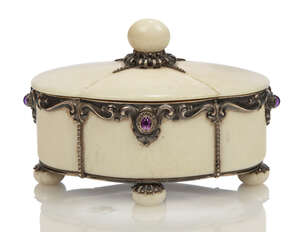 
	
		A silver and ivory box and cover with amethyst cabochons  
		c.1915, stamped maker's...