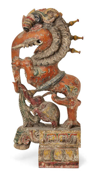 
	
		A large Balinese carved polychrome wood figure, early 20th century, depicting a mythical...