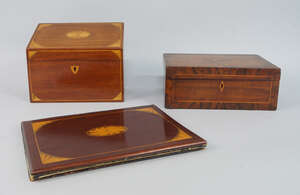 
	
		An Edwardian mahogany and  satinwood bats wing veneered stationary box, 23cm wide,...