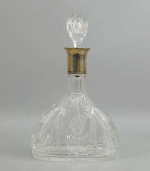 
	
		A cut glass decanter, of ovoid baluster form, with silver collar, Warsaw, Poland, BR...