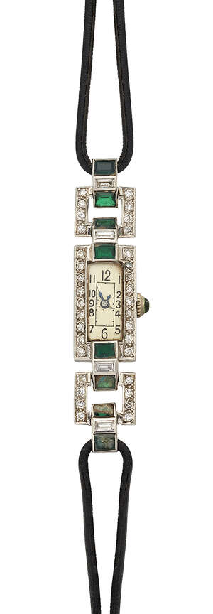 
	
		A lady's Art Deco, platinum,  emerald and diamond wristwatch, the rectangular silvered...