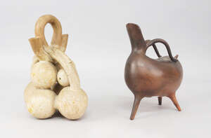 
	
		Attributed to Izgan Baz, a smoked fired earthenware aquamanile form vessel, on tripod...