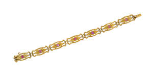 
	
		A late 19th / early 20th century French, ruby and diamond flexible bracelet, composed of...