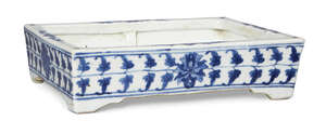 
	
		A Chinese porcelain rectangular jardinière, late 19th century, painted in underglaze blue...