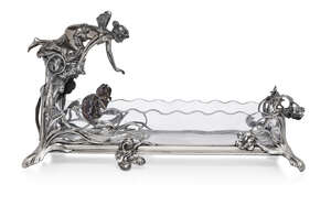 
	
		WMF (German), a silvered-metal and glass centrepiece 
		c.1900 stamped makers marks to...