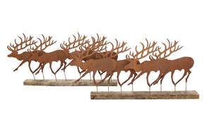 
	
		Eight cut-out sheet iron reindeer silhouettes, modern, arranged and mounted on two...