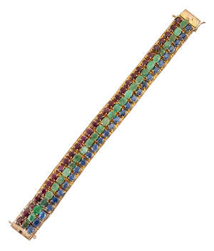 
	
		An Emerald, sapphire and ruby bracelet, designed as a series of claw-set emerald, ruby...