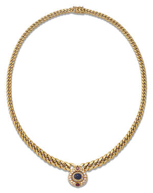 
	
		A gold necklace, of curb link design supporting a cabochon sapphire and diamond pendant,...