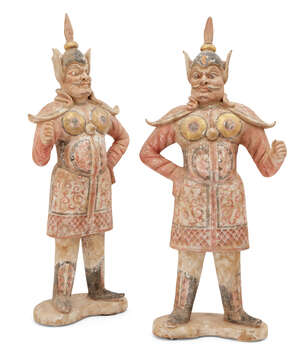 
	
		A pair of large Chinese pottery standing figures of guardians, Tang dynasty, each with...