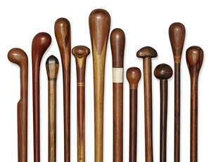 
	
		Twelve multi-cut specimen wood walking canes, early-mid 20th century, with knop handles,...