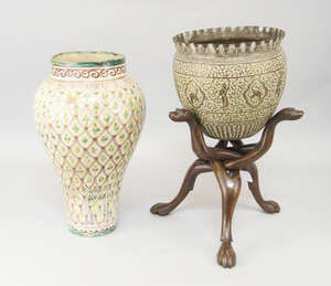 
	
		A Moroccan pottery vase, 20th century, painted to the rim with scrolling designs, the...