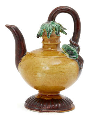 
	
		A Chinese porcelain sancai-glazed water dropper, 19th century, with a globular body, the...