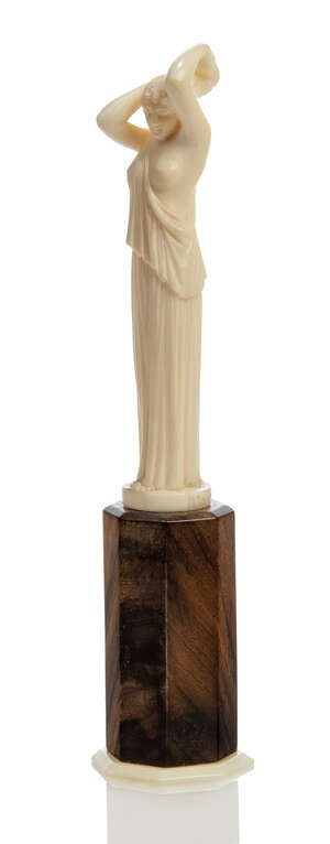 
	
		Alexandre Auguste Caron (1857-1932), a carved ivory figure 'Jeune fille se coiffant' 
		