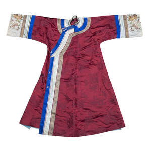 
	
		A Chinese silk embroidered robe, early 20th century, decorated with pomegranates and...