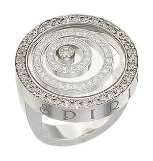 
	
		A 'Happy Spirit' diamond ring, by Chopard, with circular glazed compartment containing...
