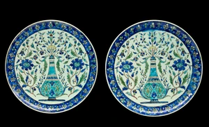 Two Kutahya pottery pottery dishes, Turkey, 20th century,&nbsp; 
Each shallow, on short straight...