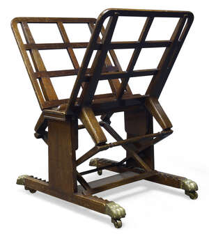 
	
		An Oak Portfolio Stand, late 19th/early 20th century, with two adjustable supports, on...