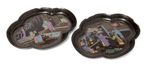 
	
		A pair of Chinese black lacquer and mother of pearl inlaid quatrefoil dishes, Kangxi...