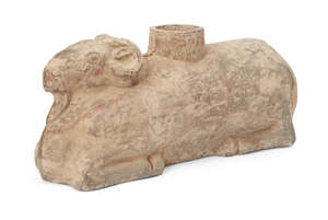 
	
		A Chinese grey pottery zoomorphic vessel, Han dynasty, modelled as a recumbent ram with...