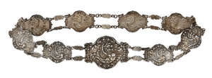 
	
		An Edwardian silver link belt, Birmingham, 1906, Levi & Salaman, each panel repousse...
