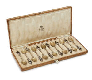 
	
		A set of twelve silver spoons, by Faberge, Moscow, c.1880, in fitted, signed box, the...